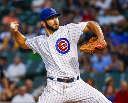 EL LANZADOR. Jake Arrieta lució en la lomita con los Cachorros, obtuvo 2 victorias, lanzó 15 2/3 entradas, con efectividad de 1.78, dio 2 bases y ponchó a 13. (AP)