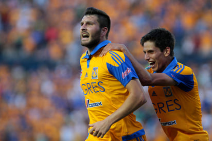 El francés André-Pierre Gignac se estrenó en el futbol mexicano anotando el segundo gol de los Tigres. (Jam Media)