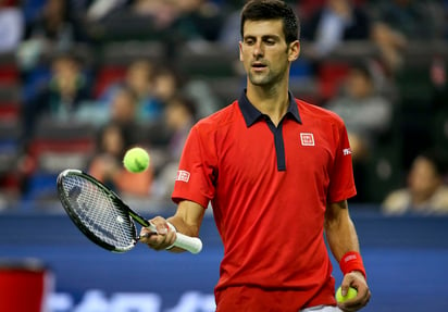 Djokovic, fresco tras su sexto título en Pekín, amplió su racha de victorias a 13 en este torneo con una contundente victoria ante el eslovaco Martin Klizan. (AP)