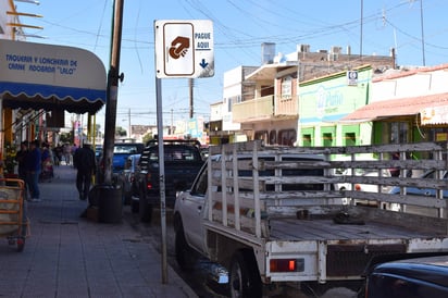 Clientes. Los comerciantes pretendían atraer más clientes con estacionamiento gratis. (MARY VÁZQUEZ)