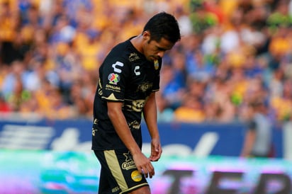 El villano. Severo Meza fue expulsado al minuto 30, provocando la goleada de los Tigres. (Jam Media)