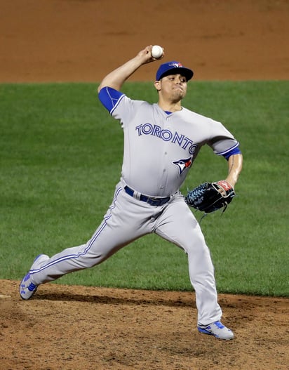 El cerrador mexicano Roberto Osuna llegó a 30 juegos salvados en la temporada luego de retirar en orden la novena entrada ante Tampa. (AP)