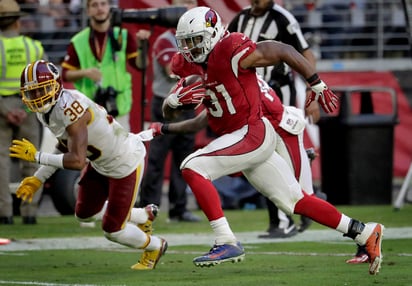 David Johnson sumó 175 yardas y anotó en par de ocasiones en la victoria de Cardinals frente a Redskins. (AP)