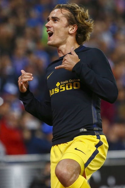 El francés Antoine Griezmann celebra su gol con el equipo colchonero. (EFE)