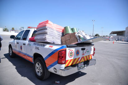 Apoyos. Se entregaron en el estacionamiento de la Expo Feria de esta ciudad. (EL SIGLO DE TORREÓN)