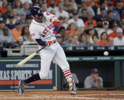 Carlos Correa produjo tres carreras en la victoria de los Astros 8-1 sobre Yanquis. (AP)