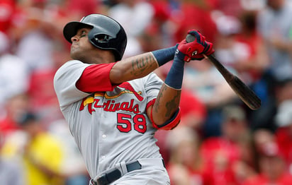 José Martínez conectó un grand slam en la cuarta entrada en la paliza 13-4 de San Luis sobre Cincinnati. (AP)