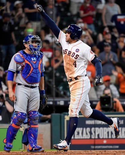 George Springer llegó a 30 jonrones en la temporada. (AP)