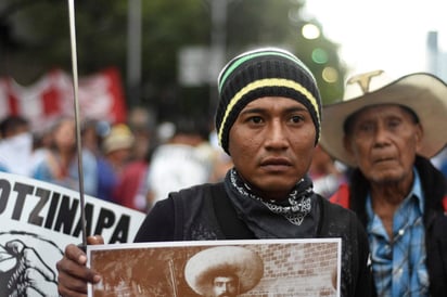 Detención.Al menos 74 normalistas michoacanos fueron detenidos por los enfrentamientos. (ARCHIVO) 