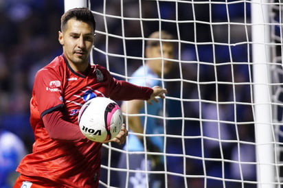 Jonathan Fabbro, de Lobos BUAP, durante el juego de la jornada 17 del Torneo Apertura 2017 de la Liga Bancomer MX.  (Jam Media)