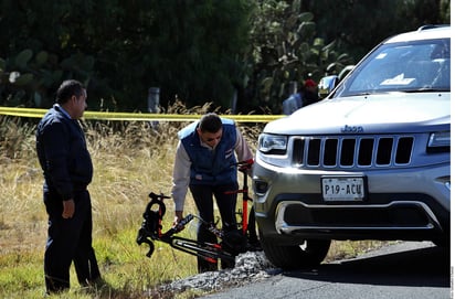 Datos. Este lunes, elementos de la Fiscalía del Estado de México hicieron una reconstrucción de hechos del asesinato de Adolfo Lagos Espinosa, directivo de Televisa. (AGENCIA REFORMA)