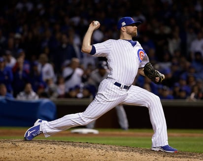 Wade Davis salvó 32 juegos la campaña pasada con los Cubs y tuvo efectividad de 2.30. (Archivo)