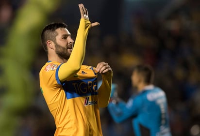 Volvió a resolver un partido André-Pierre Gignac, ídolo de la afición felina, al anotar el definitivo. (EFE)