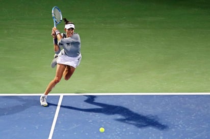 Garbiñe Muguruza derrotó 6-3, 7-5 a Catherine Bellis. (EFE)