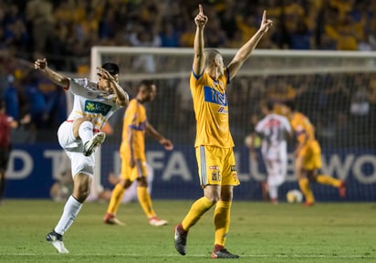 
Jorge Torres Nilo, del Tigres, en festejo durante el juego de vuelta de los octavos de final del Torneo de Campeones Concacaf 2018 en el Estadio Universitario. (EFE)