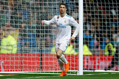 Cristiano es el segundo futbolista de la historia que consigue superar los 300 goles en Liga tras el argentino del Barcelona Leo Messi, que ya firma 372 en 408 encuentros (0.91 por partido). (AP)