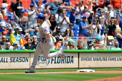 El jardinero central Ian Happ y el primera base Anthony Rizzo brillaron con sendos jonrones que permitieron a los Cachorros de Chicago ganar a domicilio por 4-8 a los renovados Marlins de Miami en el partido inaugural. (AP)