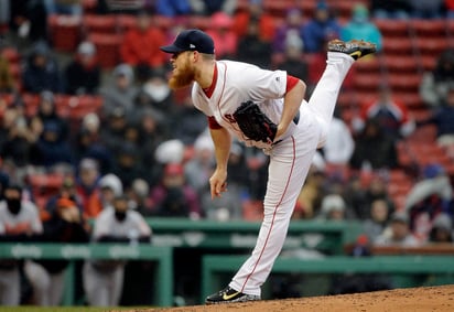 Craig Kimbrel logró su quinto rescate de la campaña al colgar el cero en la novena entrada. (AP)