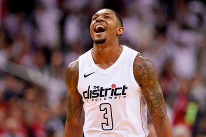 Bradley Beal metió 28 puntos al igual que John Wall para darle la victoria a los Wizards 122-103 sobre Raptors. (AP)