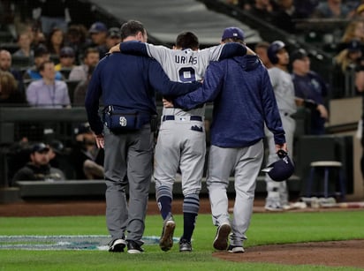 Urías sufrió una lesión en el tendón de la corva izquierda, mientras corría a la primera base, luego de conectar un rodado de out en segunda base. (AP)