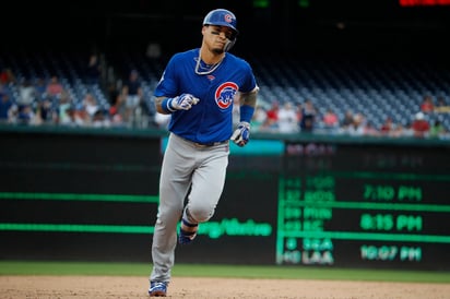 Javier Báez produjo tres carreras en el triunfo 4-3 ante Nationals.