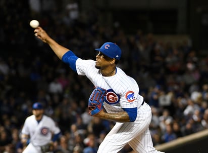 El relevista de los Cachorros de Chicago Pedro Strop durante la novena entrada del juego contra los Cerveceros de Milwaukee.