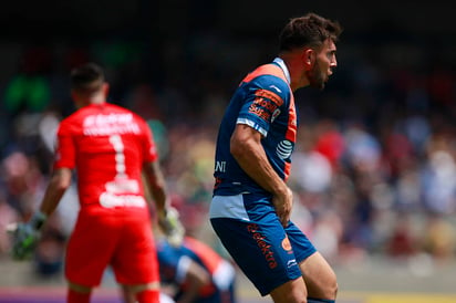 Lucas Cavallini festeja el primer gol del Puebla ante los Pumas de la UNAM. (Jam Media)