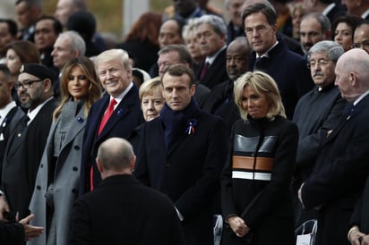 Miradas. Donald Trump recibió con una sonrisa a Putin. (AP)