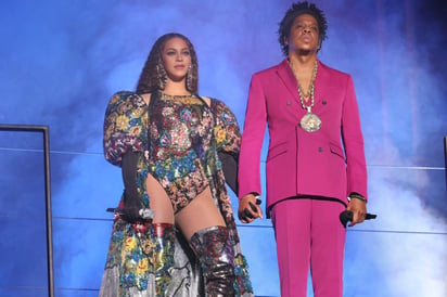 Enloquecen. Beyoncé y Jay-Z asistieron al Global Citizen Festival para recordar el trabajo y misión del activista Mandela. (ESPECIAL)