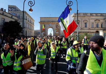 Se trata de la primera manifestación conjunta, pues el pasado 14 de diciembre la CGT realizó un paro de actividades por su cuenta aunque en apoyo al emergente movimiento social. (EFE)