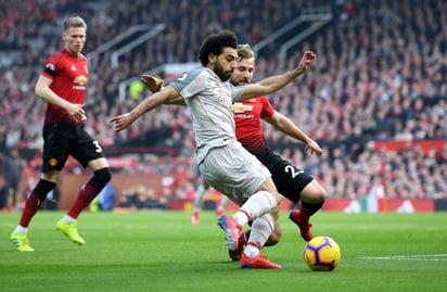 En el estadio Old Trafford, Liverpool fue incapaz de vencer a los Red Devils y seguir aumentando su ventaja sobre Manchester City por el primer lugar de la liga inglesa. (Especial)