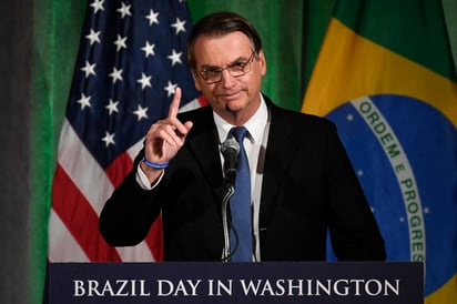 El presidente de Brasil, Jair Bolsonaro, también pronunció un discurso ante la Cámara de Comercio ayer en Washington. (AP)