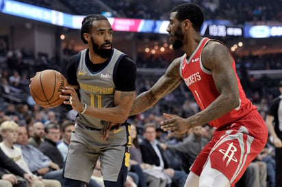 Mike Conley (i) anotó 35 puntos para los Grizzlies, en la victoria de su equipo 126-125 sobre los Rockets de Houston.