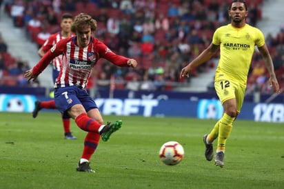 El francés Antoine Griezmann (i) ha jugado las últimas cinco temporadas con el Atlético de Madrid.