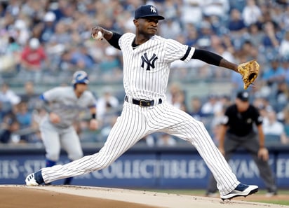 El dominicano Domingo Germán retiró a 15 en fila durante la victoria de Nueva York en casa ante Toronto. (AP)