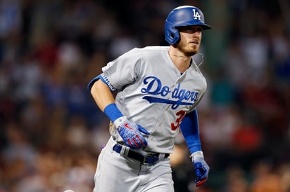 Cody Bellinger llegó a 33 cuadrangulares en la campaña gracias a sus dos estacazos ante los Filis de Filadelfia. (ARCHIVO)