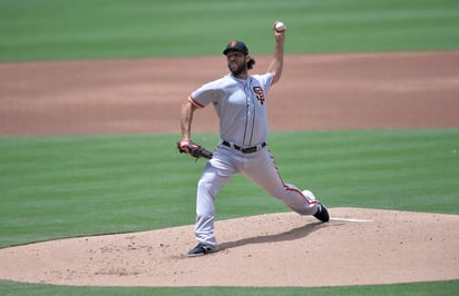 Madison Bumgarner, lanzador de los Gigantes de San Francisco, es uno de los 'peces grandes' que podrían ser canjeados a un equipo contendiente a la postemporada. (AP)