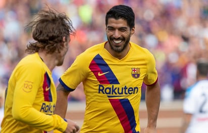 La dupla entre Luis Suárez (d) y Antoine Griezmann (i) luce como un gran atractivo para el Barcelona de esta temporada. (EFE)