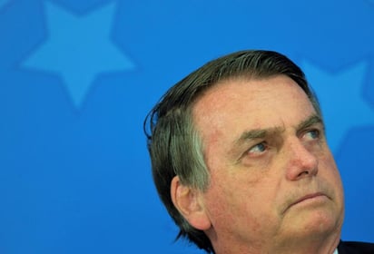 Bolsonaro recordó que este mismo viernes firmó un decreto que permite el envío de miembros y equipos de las Fuerzas Armadas a los estados amazónicos que los soliciten para ayudar a frenar la deforestación y combatir los incendios. (ARCHIVO)