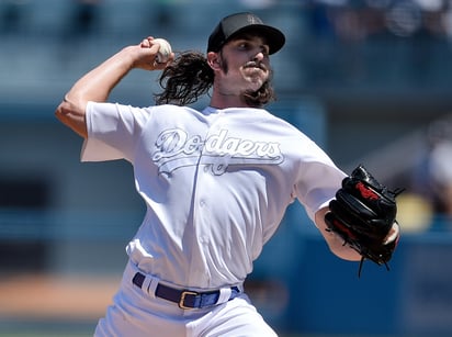 El abridor de los Dodgers, Tony Gonsolin, permitió una carrera en cinco entradas de trabajo y logró su segunda victoria de la campaña. (AP)