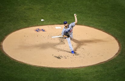 Clayton Kershaw llegó a 14 triunfos. (ESPECIAL)