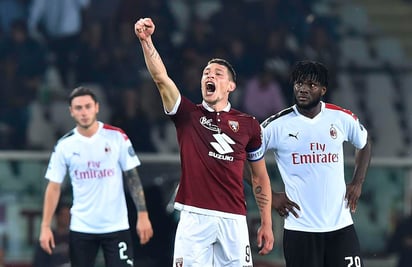 Andrea Belotti (c) marcó dos goles en cinco minutos para que la escuadra de Turín se quedara la victoria en casa. (AP)