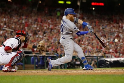 Justin Turner conectó un jonrón de tres carreras en la sexta entrada. (AP)