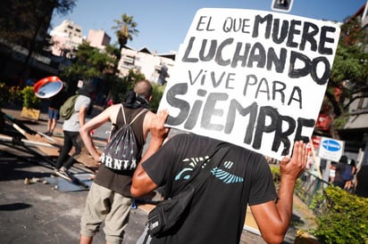 'Una de las principales responsabilidades del Estado es resguardar el orden público y la seguridad ciudadana', manifestó el presidente respaldando el trabajo realizado por la policía chilena hasta el momento. (EFE)