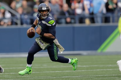 Russell Wilson, mariscal de campo de los Halcones Marinos de Seattle, es firme candidato a ganar el premio al Jugador Más Valioso de la temporada. (AP)