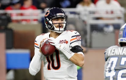 Mitchell Trubisky lanzó tres pases de anotación, en la victoria de los Osos 24-20 sobre los Leones de Detroit. (AP)