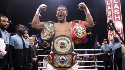 Este sábado Anthony Joshua venció fácilmente por decisión unánime a Andy Ruiz, para recuperar sus títulos. (AP)