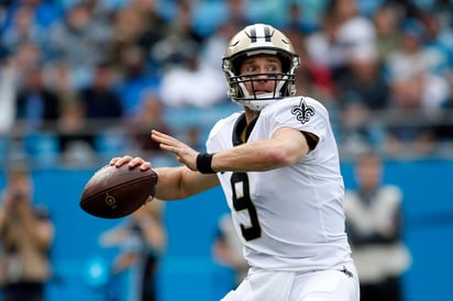 Drew Brees lanzó tres pases de anotación en el partido. (AP)