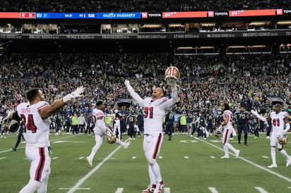 Con su dramático triunfo del domingo sobre Seattle, los 49'ers de San Francisco obtuvieron el primer sembrado de la Nacional. (AP)