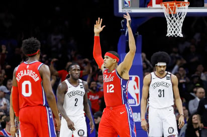 Tobias Harris (12) anotó 34 puntos ayer, en el triunfo de los 76'ers 117-106 sobre los Nets de Brooklyn. (AP)